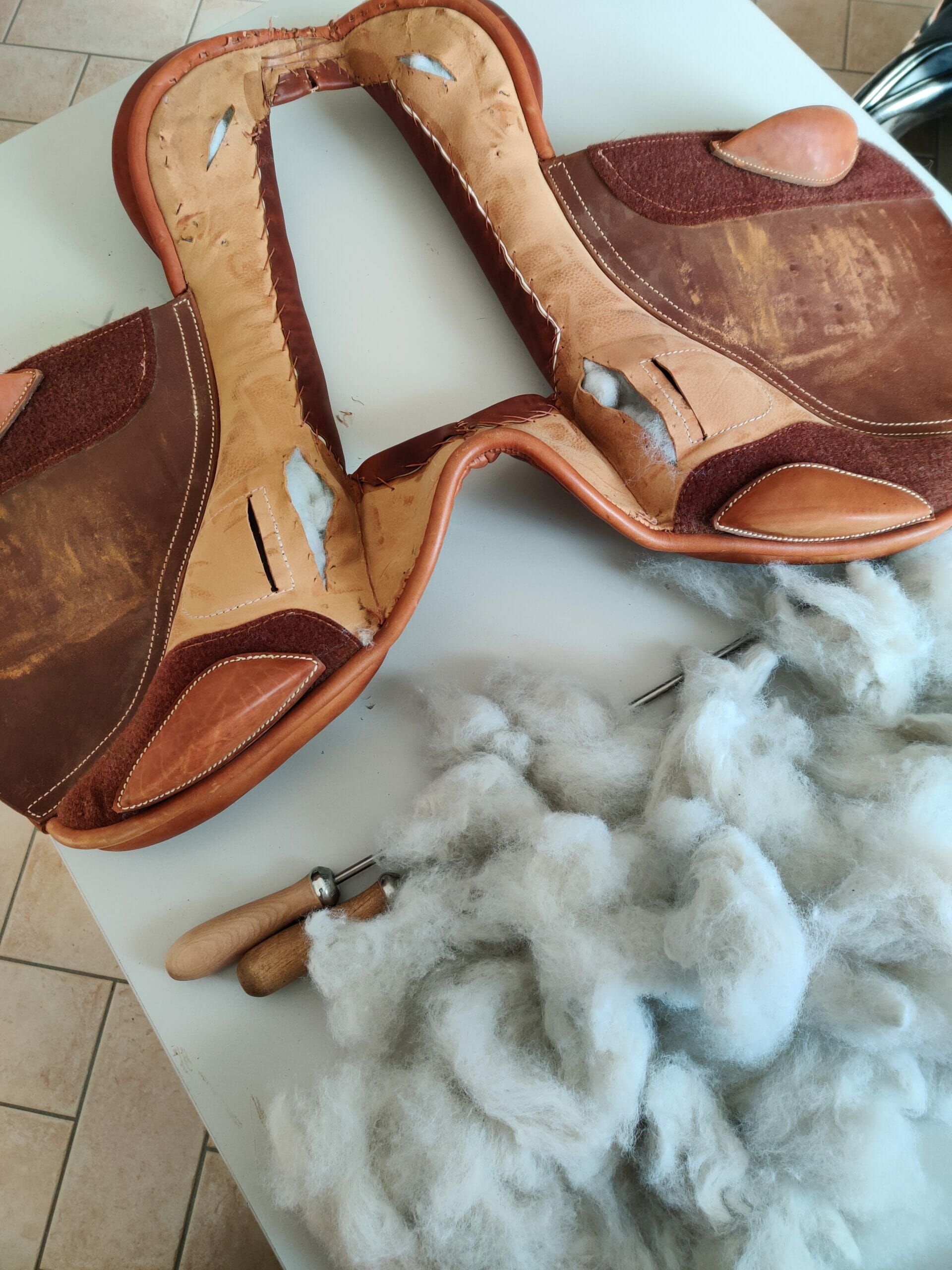 Ilaria saddle service - saddle fitting - reimbottitura cuscini
